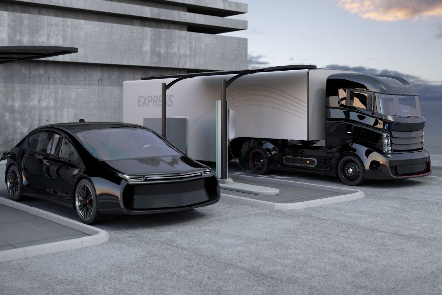 An EV truck and car charging